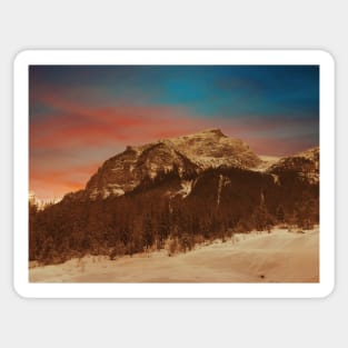 Sunset over the snowy mountains Sticker